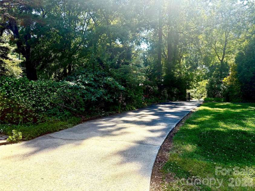 5500 Saddlewood Lane, Mint Hill, NC 28227.  MLS# CAR4382931, YatesRealty ID 31815. Beautiful driveway into the property!