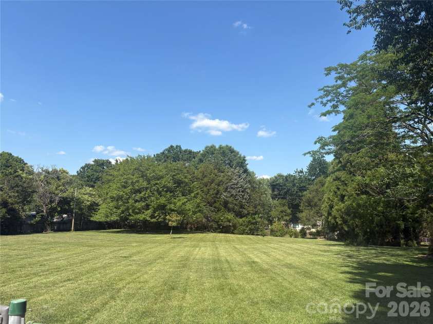5500 Saddlewood Lane, Mint Hill, NC 28227.  MLS# CAR4382931, YatesRealty ID 31815. Huge, level, open back yard!  Wow!
