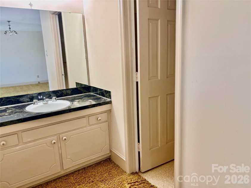 5500 Saddlewood Lane, Mint Hill, NC 28227.  MLS# CAR4382931, YatesRealty ID 31815. Master offers vanity in suite.
