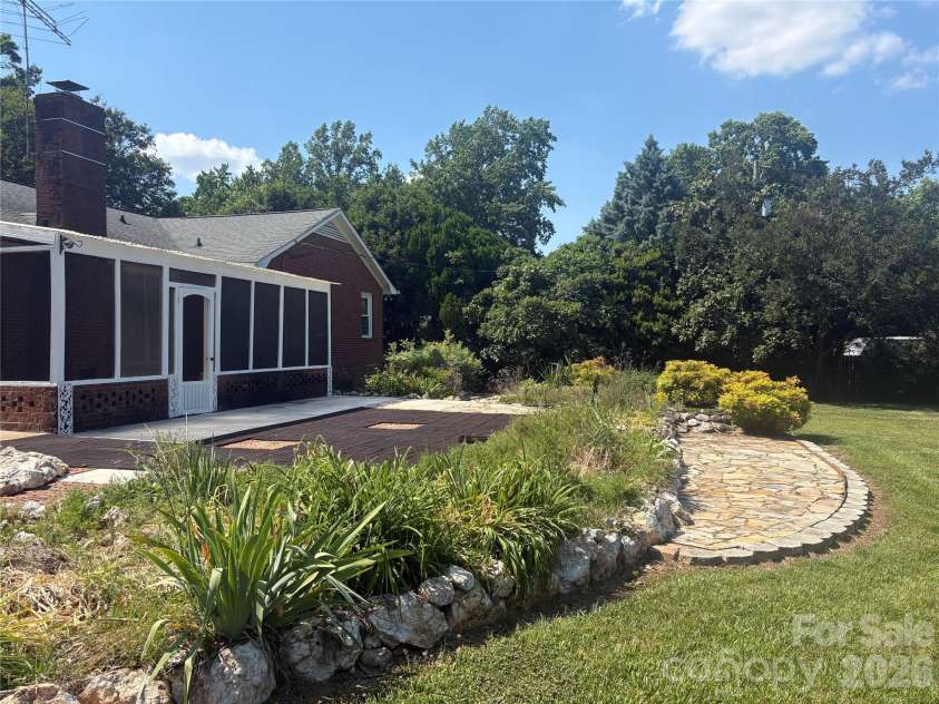 5500 Saddlewood Lane, Mint Hill, NC 28227.  MLS# CAR4382931, YatesRealty ID 31815. Multiple fish ponds! Pretty landscaping!