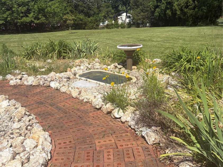 5500 Saddlewood Lane, Mint Hill, NC 28227.  MLS# CAR4382931, YatesRealty ID 31815. Pretty brick and rock walk way!