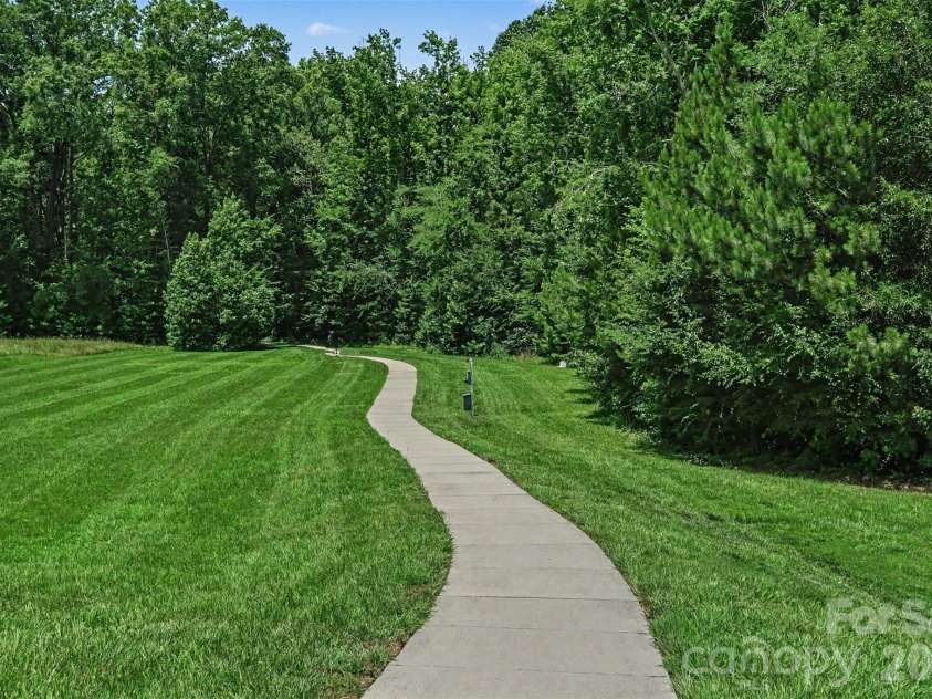 2521 Surveyor General Drive, Waxhaw, NC 28173.  MLS# CAR4426131, YatesRealty ID 31822. Community Walking Trails