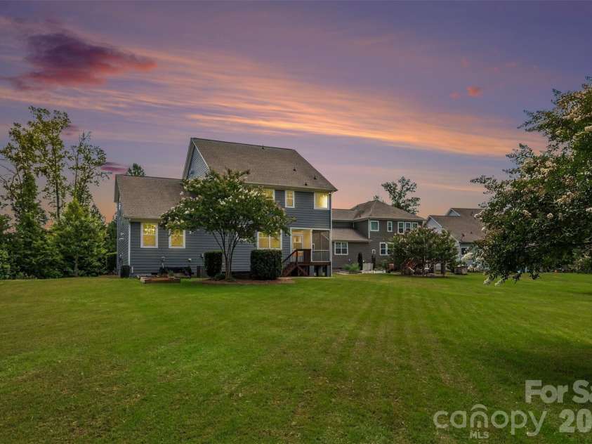 2521 Surveyor General Drive, Waxhaw, NC 28173.  MLS# CAR4426131, YatesRealty ID 31822. Large and level lot with a wooded backdrop
