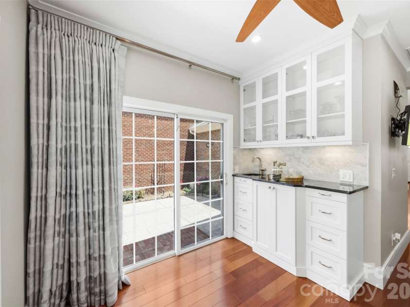 9415 Bonnie Briar Circle, Charlotte, NC 28277.  MLS# CAR4389175, YatesRealty ID 31824. Wet bar & Door to Patio