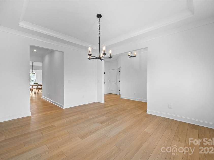 4627 Cava Court, Indian Land, SC 29707.  MLS# CAR4286634, YatesRealty ID 31825. Dining Rooms open up to the butler pantry space