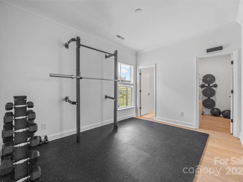 4627 Cava Court, Indian Land, SC 29707.  MLS# CAR4286634, YatesRealty ID 31825. First Floor guest suite- currently being used as a home gym