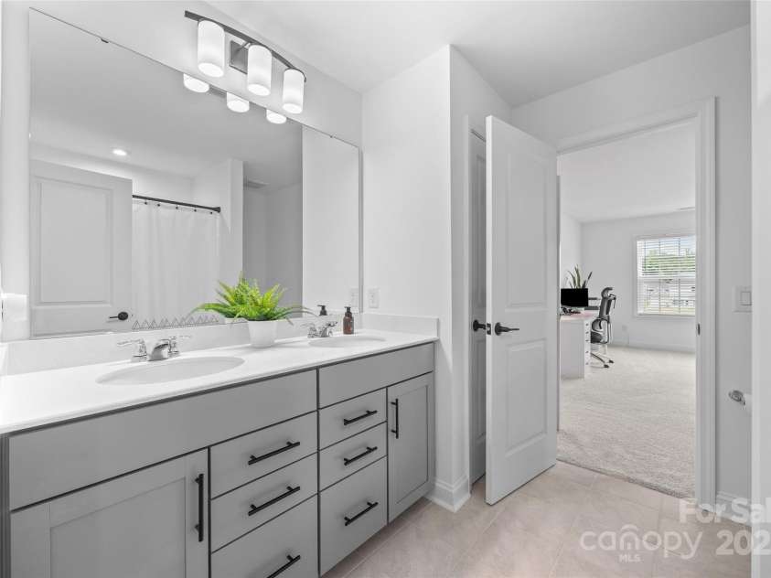 4627 Cava Court, Indian Land, SC 29707.  MLS# CAR4286634, YatesRealty ID 31825. Full Bath Upstairs with dual sinks, quartz countertops, and a tub/shower