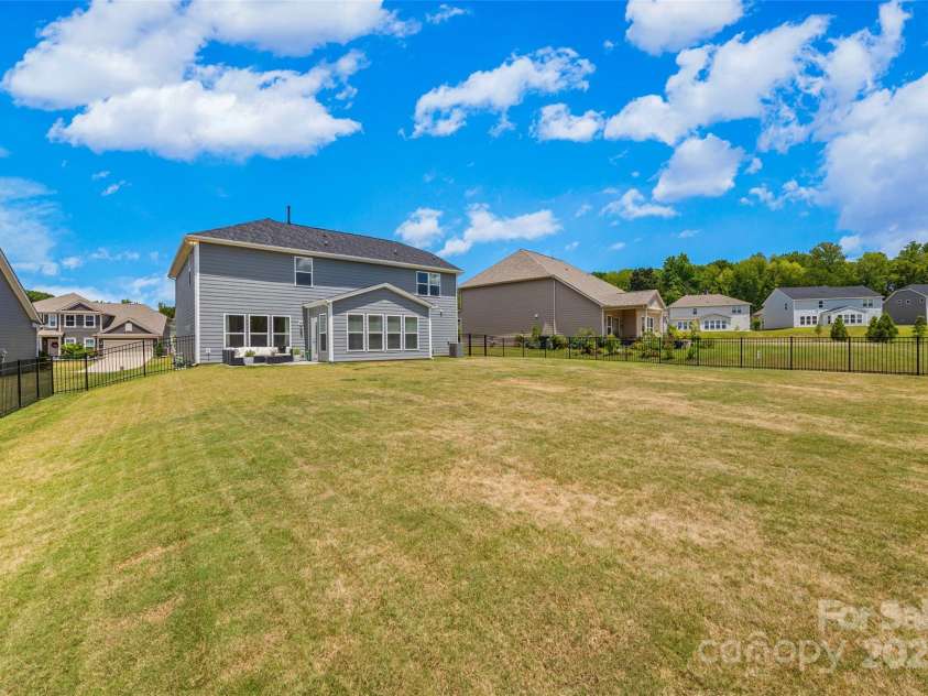 4627 Cava Court, Indian Land, SC 29707.  MLS# CAR4286634, YatesRealty ID 31825. This large fenced in back yard offers so many possibilities for a back yard oasis