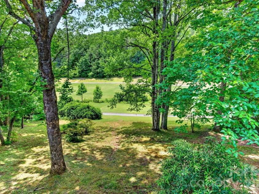 103 Richard Lane, Black Mountain, NC 28711.  MLS# CAR4393479, YatesRealty ID 31831. Back yard - backs up to Black Mountain Golf Course