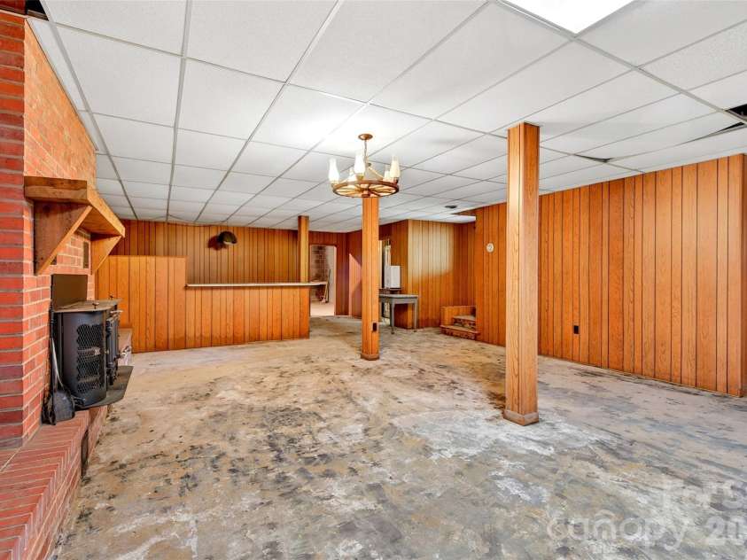 103 Richard Lane, Black Mountain, NC 28711.  MLS# CAR4393479, YatesRealty ID 31831. Basement den