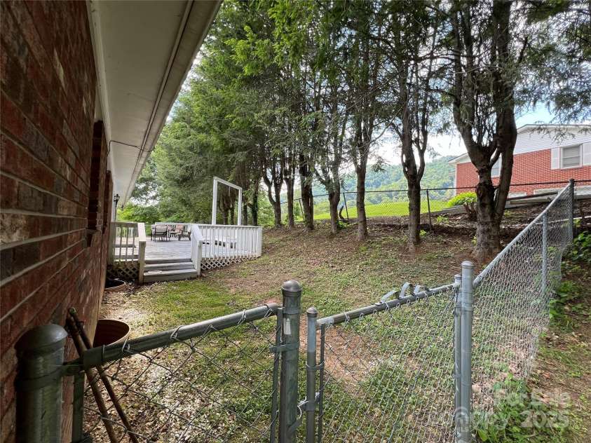 92 Mountain View Road, Burnsville, NC 28714.  MLS# CAR4278979, YatesRealty ID 31832. Chain link fenced area
