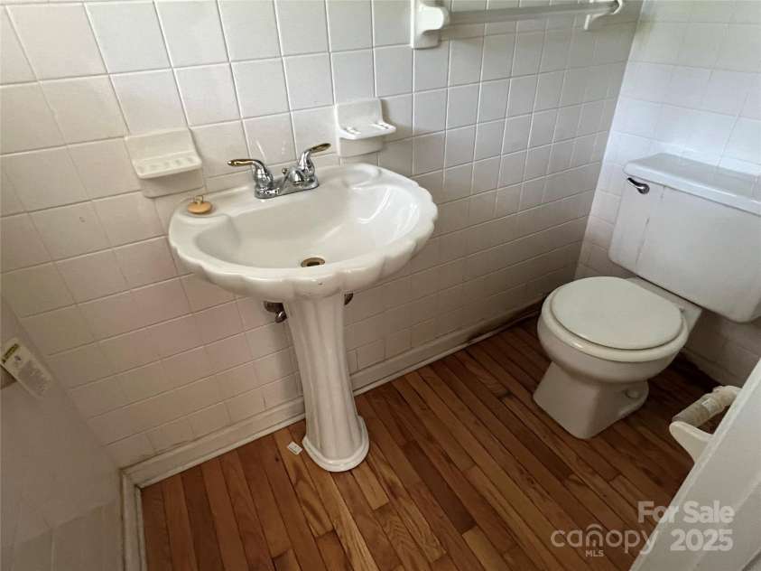 92 Mountain View Road, Burnsville, NC 28714.  MLS# CAR4278979, YatesRealty ID 31832. Half bath off bedroom