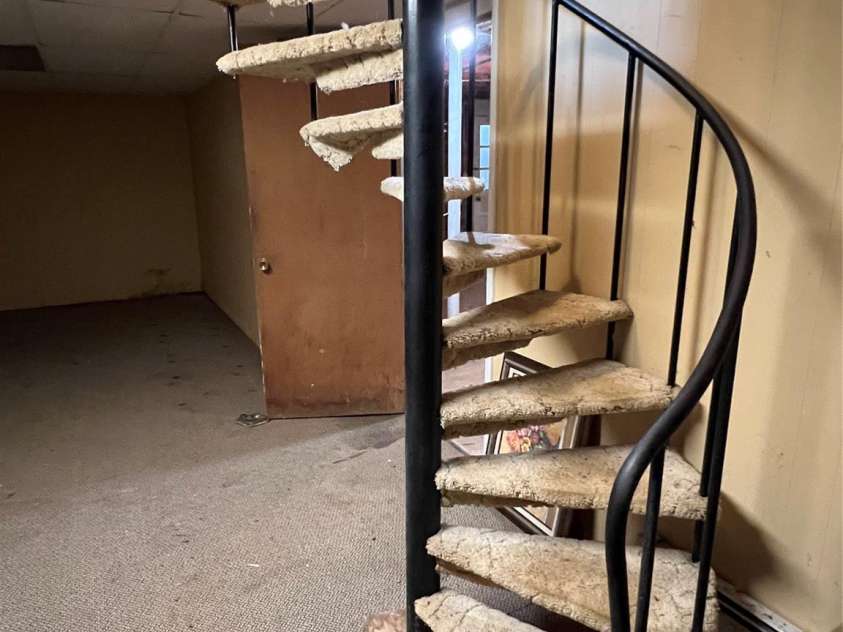 92 Mountain View Road, Burnsville, NC 28714.  MLS# CAR4278979, YatesRealty ID 31832. Spiral staircase