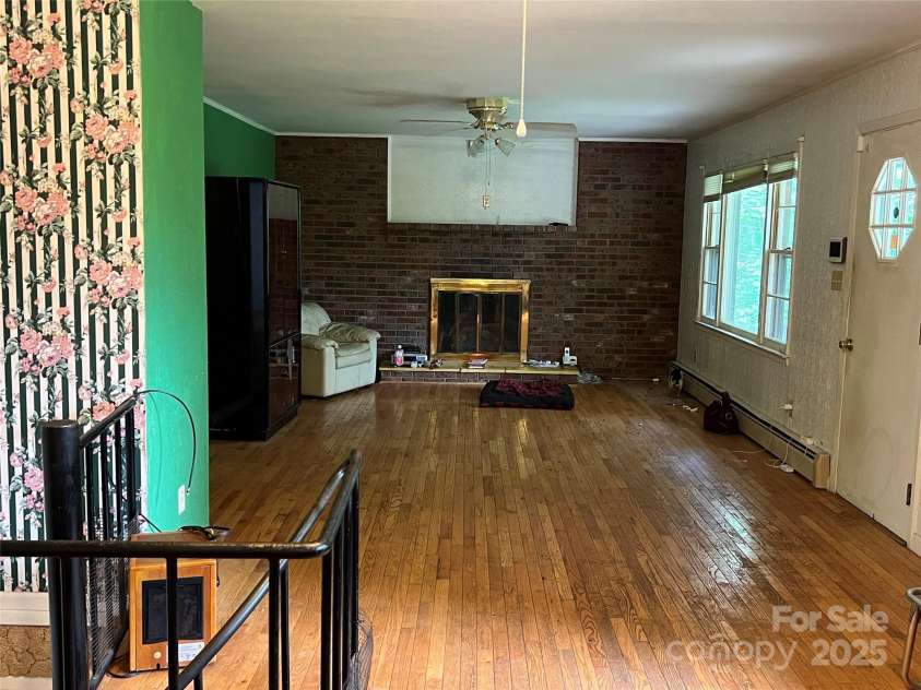 92 Mountain View Road, Burnsville, NC 28714.  MLS# CAR4278979, YatesRealty ID 31832. Upstairs gas fireplace