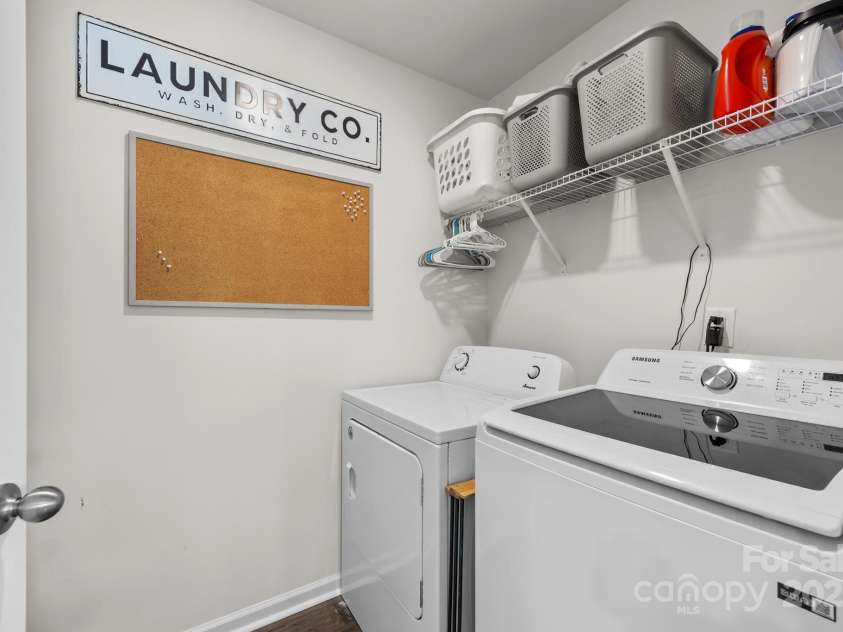 183 Marathon Lane, Candler, NC 28715.  MLS# CAR4284334, YatesRealty ID 31833. Main level laundry room.