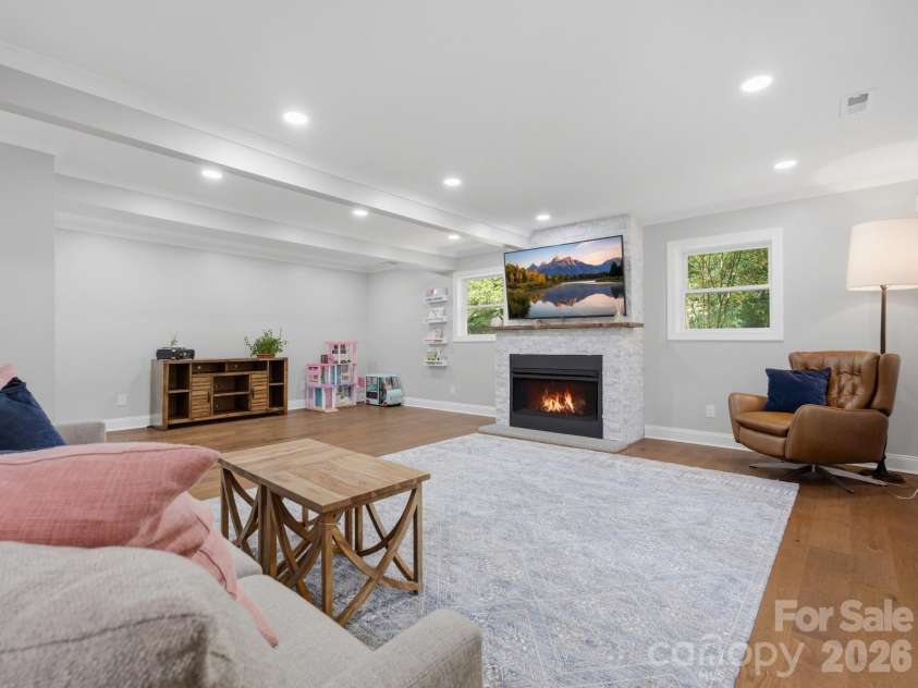6819 Woodstock Drive, Charlotte, NC 28210.  MLS# CAR4394251, YatesRealty ID 31834. Basement Family Room
