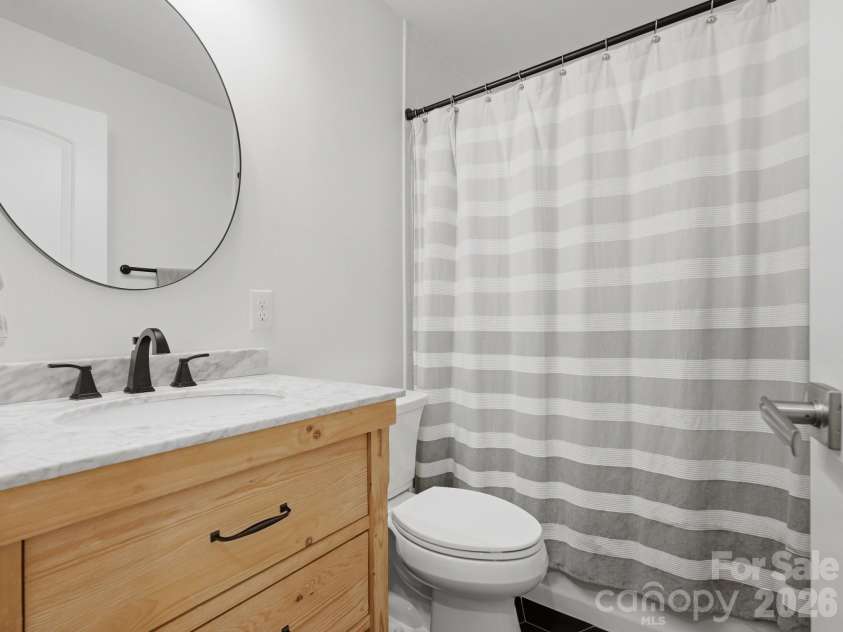 6819 Woodstock Drive, Charlotte, NC 28210.  MLS# CAR4394251, YatesRealty ID 31834. Guest Bathroom