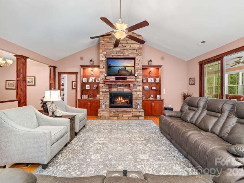 560 Blue Sky Drive, Dallas, NC 28034.  MLS# CAR4262735, YatesRealty ID 31836. Great Room with Stone Fireplace