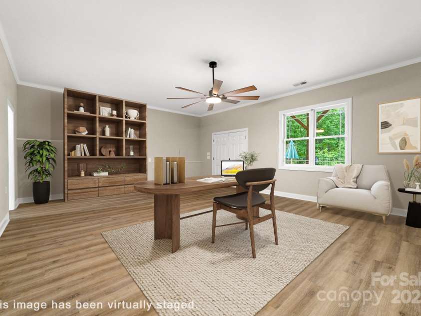 560 Blue Sky Drive, Dallas, NC 28034.  MLS# CAR4262735, YatesRealty ID 31836. Oversized Multi-Use Room Thoughtfully Staged As An Office Space