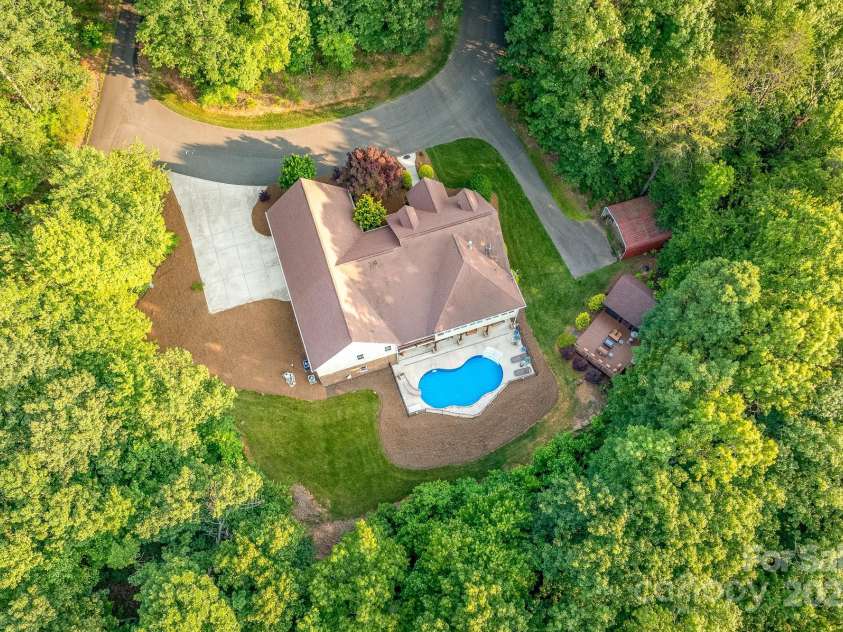 560 Blue Sky Drive, Dallas, NC 28034.  MLS# CAR4262735, YatesRealty ID 31836. Peaceful, secluded, and surrounded by nature, all from the comfort of your own home!