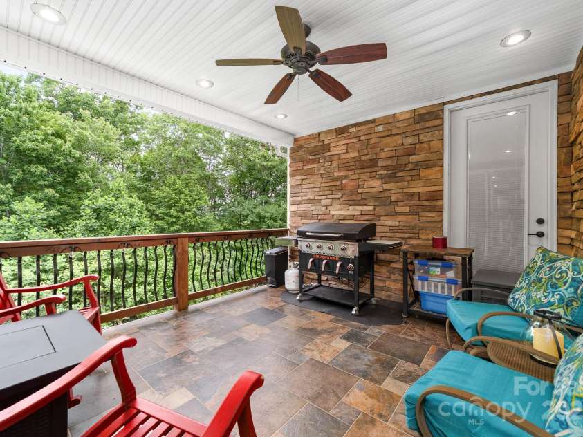 560 Blue Sky Drive, Dallas, NC 28034.  MLS# CAR4262735, YatesRealty ID 31836. Spacious Outdoor Balcony – Ideal for Savoring Your Morning Coffee or Grilling While Taking in the Fresh Air.