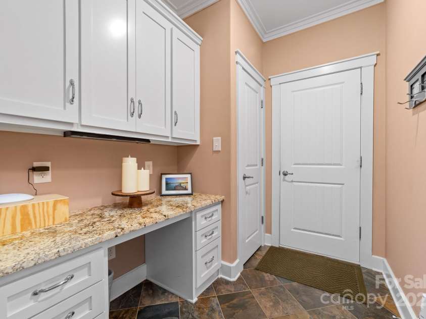 560 Blue Sky Drive, Dallas, NC 28034.  MLS# CAR4262735, YatesRealty ID 31836. Tucked Away Built In Secretary Desk & Nook