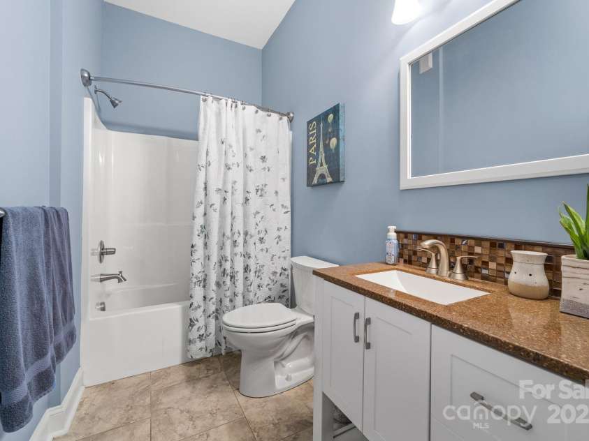 560 Blue Sky Drive, Dallas, NC 28034.  MLS# CAR4262735, YatesRealty ID 31836. Well-placed Bathroom for Easy Access to Adjoining Areas Including The Pool