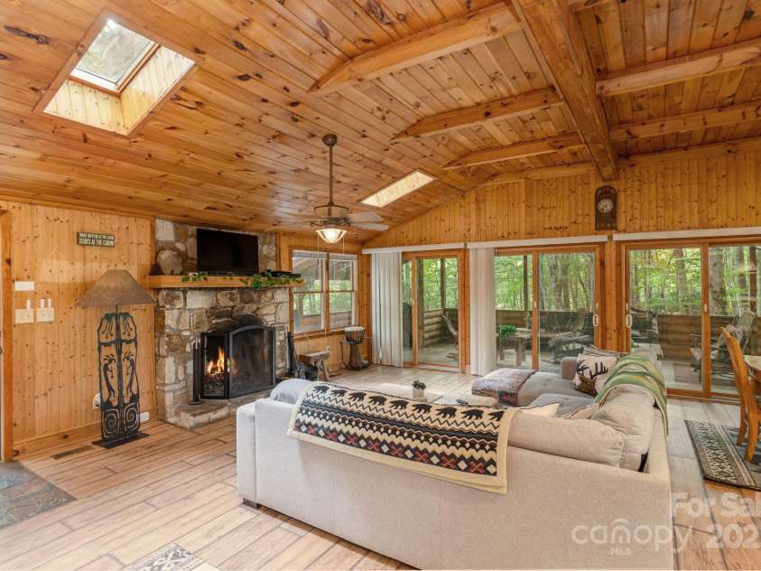 3014 Slick Fisher Road, Lake Toxaway, NC 28747.  MLS# CAR4289982, YatesRealty ID 31838. Cozy Living Room