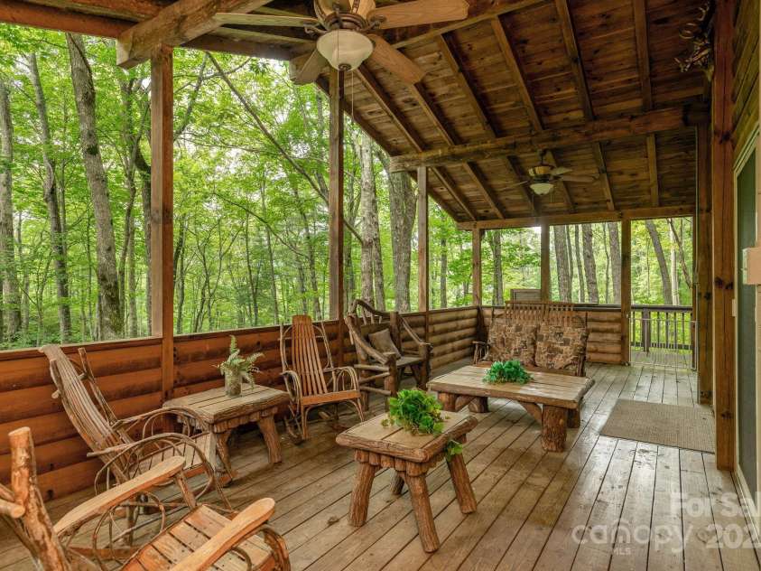 3014 Slick Fisher Road, Lake Toxaway, NC 28747.  MLS# CAR4289982, YatesRealty ID 31838. Entertain on the Covered Front Porch