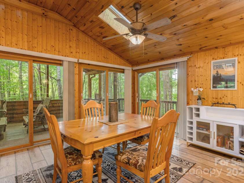 3014 Slick Fisher Road, Lake Toxaway, NC 28747.  MLS# CAR4289982, YatesRealty ID 31838. Feel like your outside in this tree house