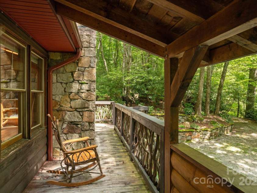 3014 Slick Fisher Road, Lake Toxaway, NC 28747.  MLS# CAR4289982, YatesRealty ID 31838. Rocking Chair Porch