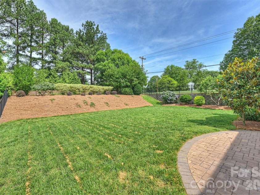 3729 Benseval Lane, Matthews, NC 28105.  MLS# CAR4382542, YatesRealty ID 31842. Back Yard