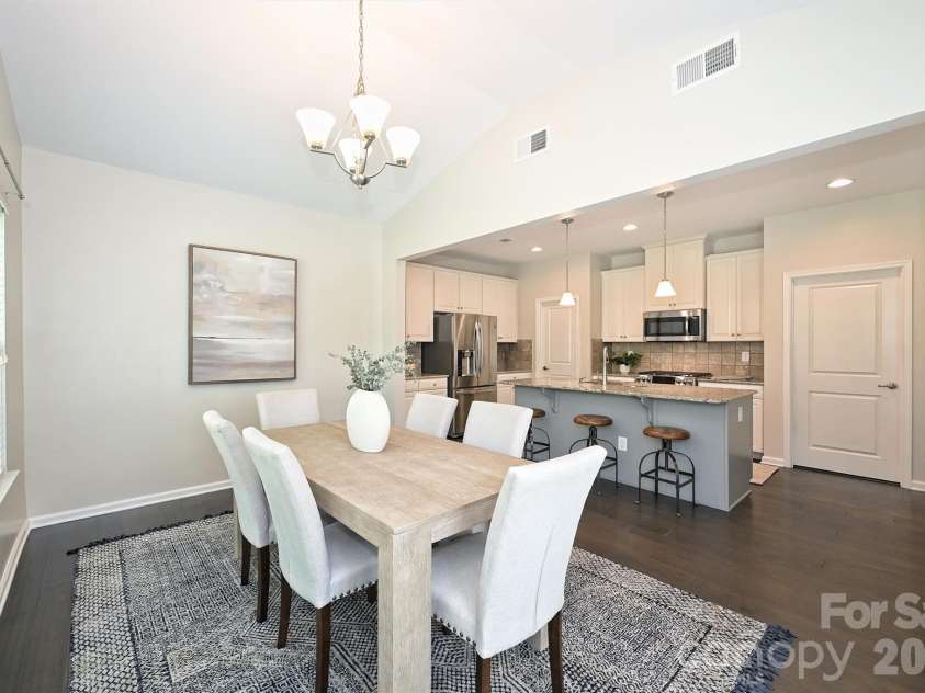 3729 Benseval Lane, Matthews, NC 28105.  MLS# CAR4382542, YatesRealty ID 31842. Dining Room is open to the Kitchen