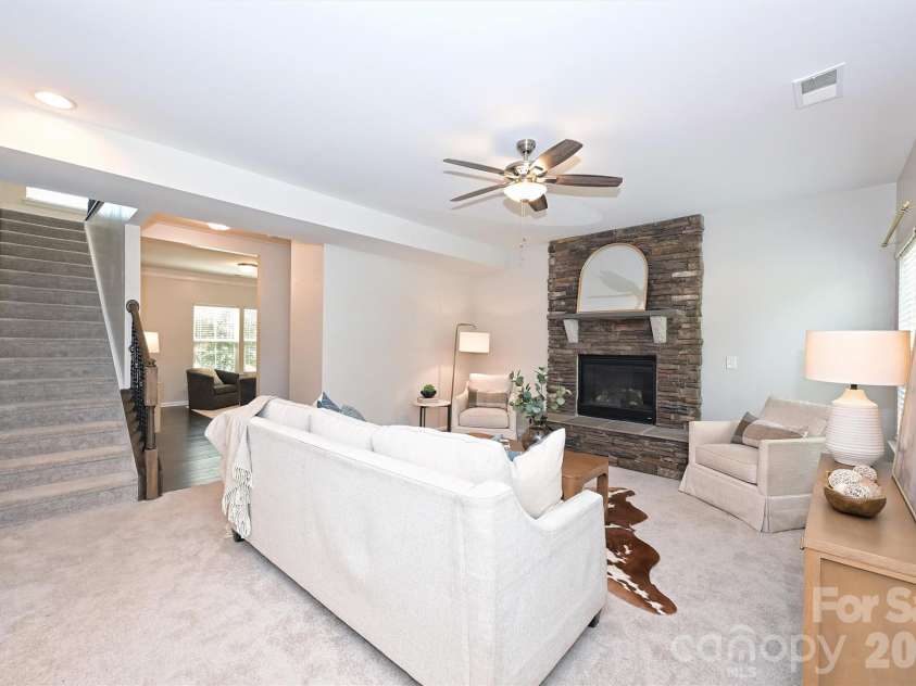 3729 Benseval Lane, Matthews, NC 28105.  MLS# CAR4382542, YatesRealty ID 31842. Love the stacked stone fireplace