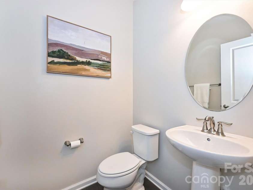 3729 Benseval Lane, Matthews, NC 28105.  MLS# CAR4382542, YatesRealty ID 31842. Lower level Powder Room