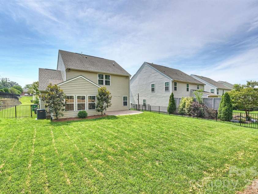 3729 Benseval Lane, Matthews, NC 28105.  MLS# CAR4382542, YatesRealty ID 31842. Rear of the home