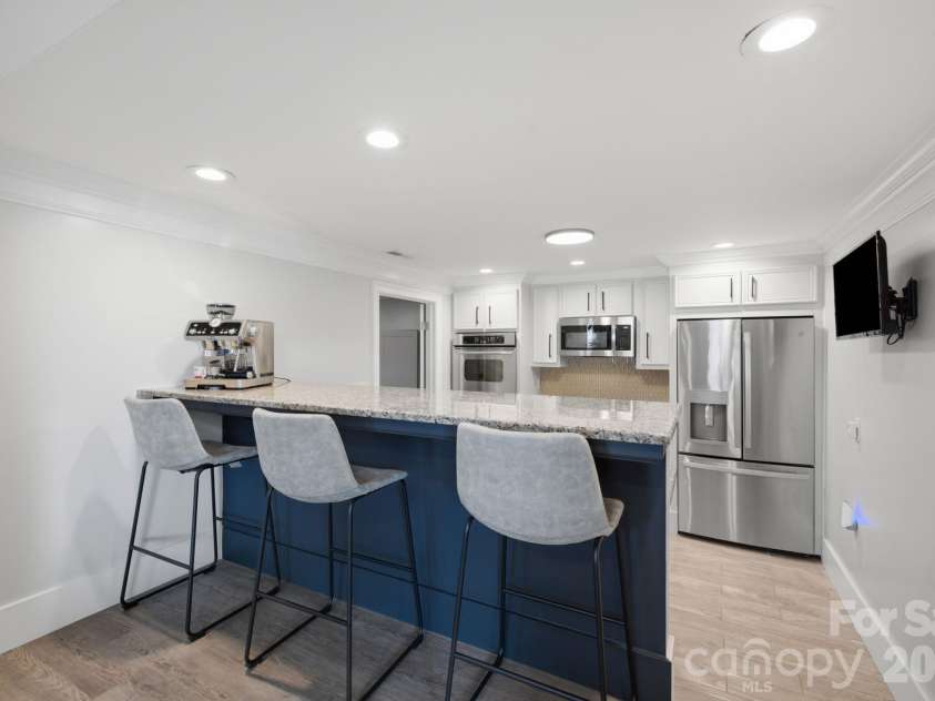 2640 Sadler Road, Charlotte, NC 28278.  MLS# CAR4390704, YatesRealty ID 31847. Lower Level Kitchen
