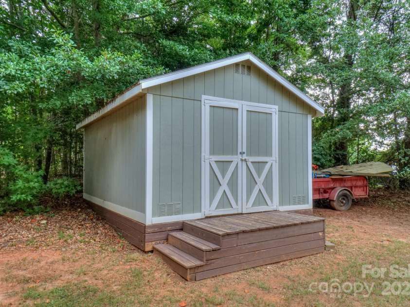 136 Buttercup Drive, Mooresville, NC 28117.  MLS# CAR4284193, YatesRealty ID 31853. Another shed on the property for storage.