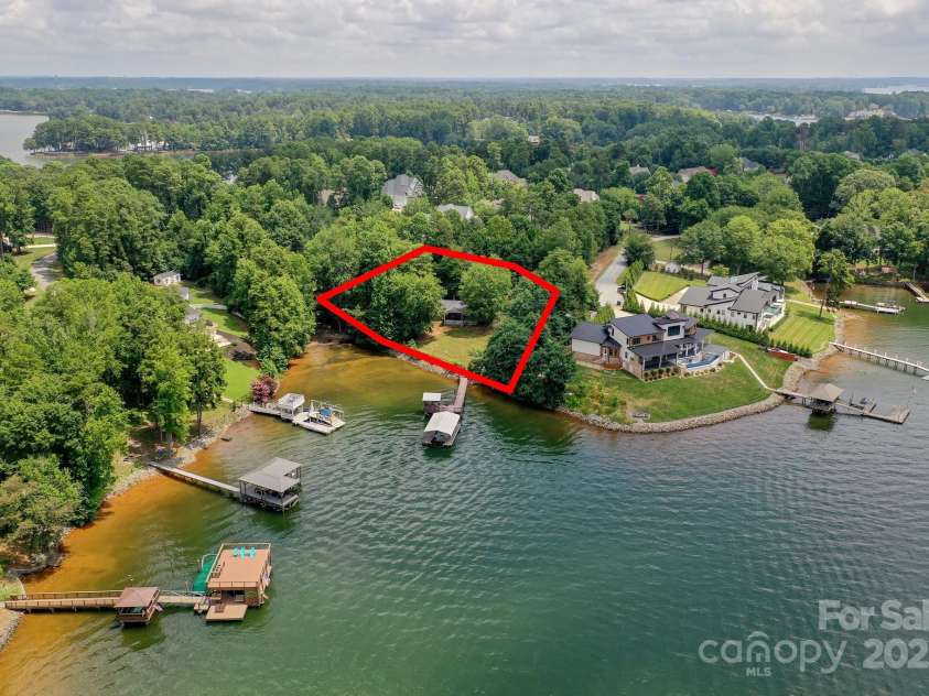 136 Buttercup Drive, Mooresville, NC 28117.  MLS# CAR4284193, YatesRealty ID 31853. Wonderful lot tucked away for water activities but still big water.
