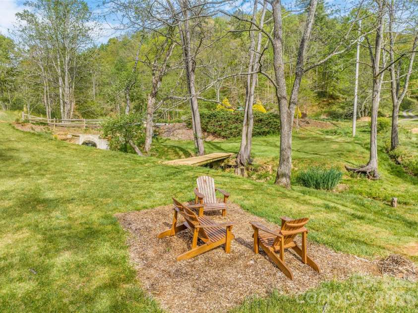 446 Amanda Drive, Mars Hill, NC 28754.  MLS# CAR4368422, YatesRealty ID 31853. Community Green Space by Creek