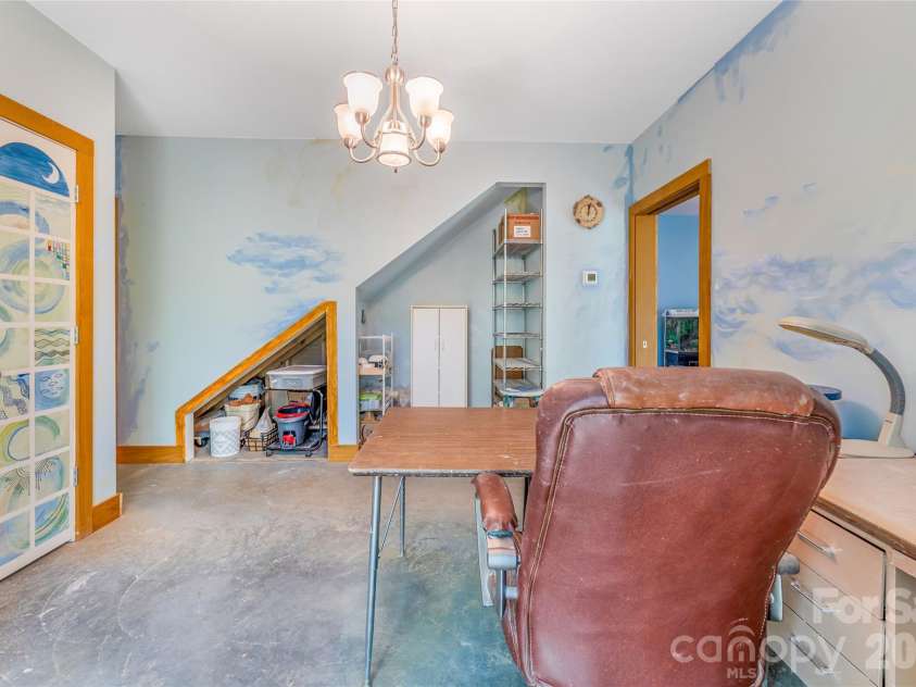 446 Amanda Drive, Mars Hill, NC 28754.  MLS# CAR4368422, YatesRealty ID 31853. Downstairs Bedroom used as Art Studio