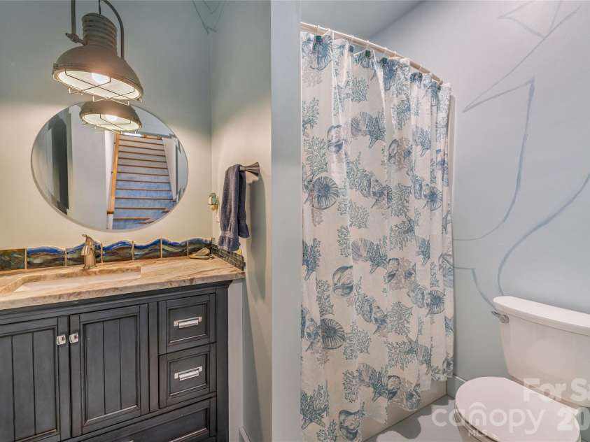 446 Amanda Drive, Mars Hill, NC 28754.  MLS# CAR4368422, YatesRealty ID 31853. Downstairs Full Bath