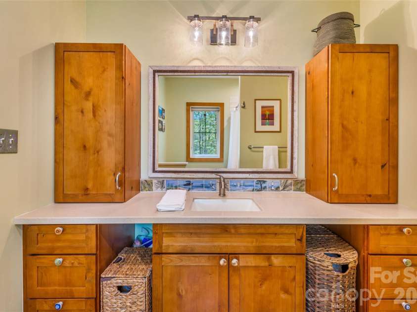 446 Amanda Drive, Mars Hill, NC 28754.  MLS# CAR4368422, YatesRealty ID 31853. Primary Bath Vanity