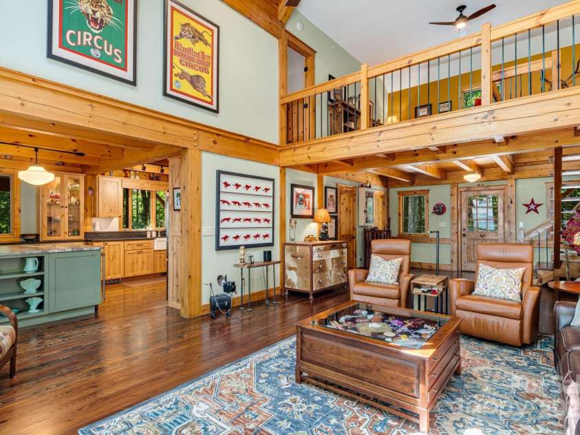 492 Henry Mountain Road, Brevard, NC 28712.  MLS# CAR4278583, YatesRealty ID 31855. Great view of the office/loft, great room, and kitchen.