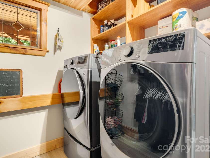492 Henry Mountain Road, Brevard, NC 28712.  MLS# CAR4278583, YatesRealty ID 31855. Laundry located in the master closest.