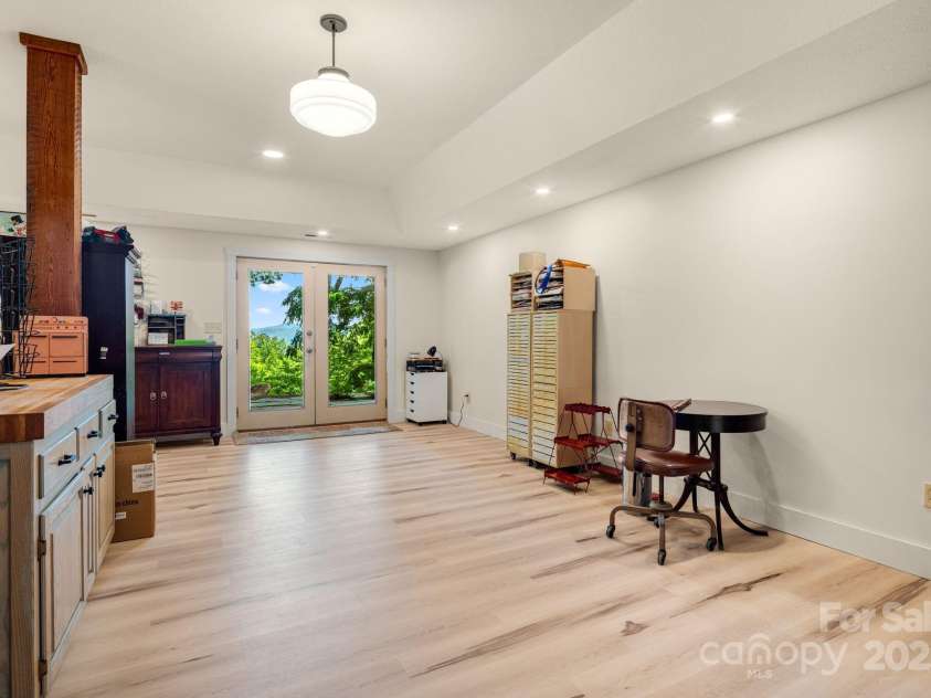 492 Henry Mountain Road, Brevard, NC 28712.  MLS# CAR4278583, YatesRealty ID 31855. Right side of basement.