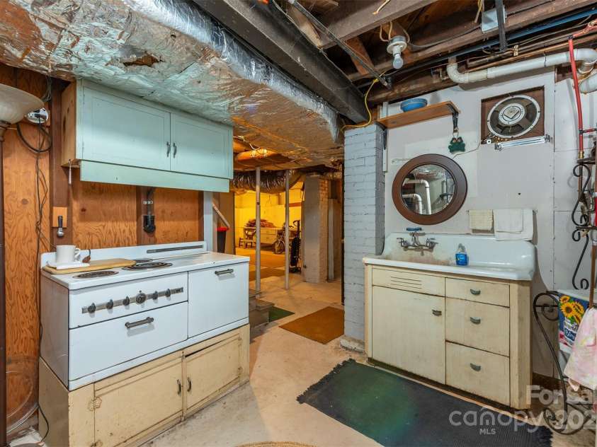 20 Vandalia Avenue, Asheville, NC 28806.  MLS# CAR4290211, YatesRealty ID 31857. Unfinished Basement