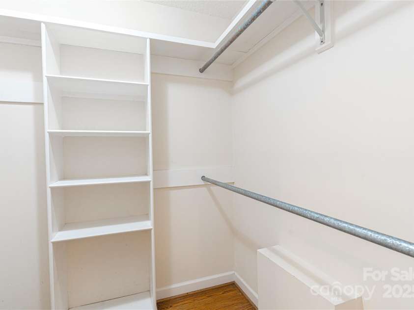 2011 Barden Road, Charlotte, NC 28226.  MLS# CAR4278483, YatesRealty ID 31858. One of the 2 primary walk-in closets.