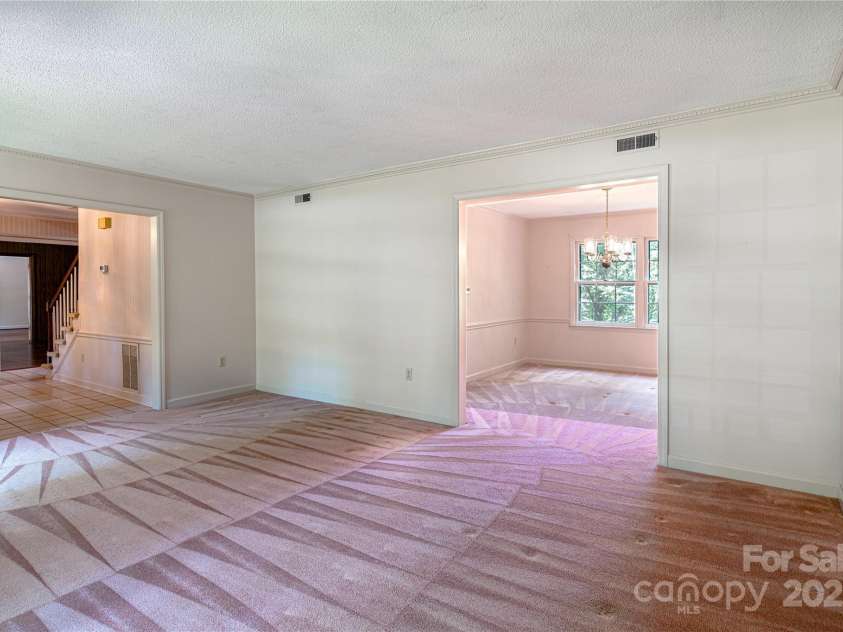 2011 Barden Road, Charlotte, NC 28226.  MLS# CAR4278483, YatesRealty ID 31858. View to dining room from living room.