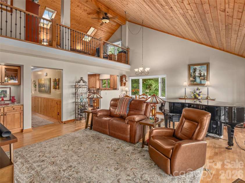503 Fleetwood Plaza, Laurel Park, NC 28739.  MLS# CAR4379212, YatesRealty ID 31859. Living room looking toward dining area